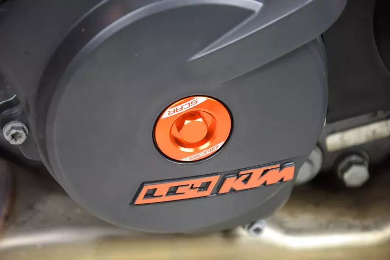 SCAR Racing - Engine Plug - CNC Anodized Aluminum - Orange - Husqvarna KTM